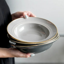 Load image into Gallery viewer, Kovan Ceramic Pasta/Soup Bowl by Allthingscurated is a stylish and functional bowl that offers versatility and practicality in usage. Perfectly sized for pasta, soups, stews, desserts and more. It’s a must-have addition to your dinnerware collection for all occasions from formal dining to everyday casual meals. Comes in gray and black.