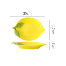 Load image into Gallery viewer, Summertime Lemon Shape Dinnerware by Allthingscurated will brighten any meal with its bright, cheery color. Made from high quality porcelain, they are perfect for adding color and interest to your Sunday brunch to outdoor picnics, and brighten up your summer tablescape. Featured here is the large plate.