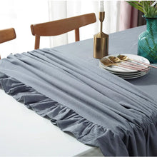 Load image into Gallery viewer, Introducing Ruffled Cotton Tablecloth by Allthingscurated. Made from 100% cotton, our tablecloth exudes French country charm with its romantic, frilly ruffles. With the perfect balance of decorative and laid-back, they have a welcoming and comforting vibe. Available in 8 solid colors.