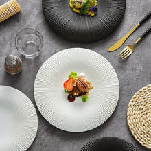 Load image into Gallery viewer, Line Textured Dinner Plates by Allthingscurated featured distinct bold lines that exude modernity and timelessness. Come in stylish black and white, they mix and match easily with your existing dinnerware and suitable for a wide range of occasions. Come in 2 sizes.