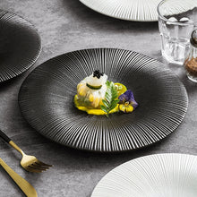 Load image into Gallery viewer, Line Textured Dinner Plates by Allthingscurated featured distinct bold lines that exude modernity and timelessness. Come in stylish black and white, they mix and match easily with your existing dinnerware and suitable for a wide range of occasions. Come in 2 sizes.