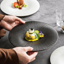 Load image into Gallery viewer, Line Textured Dinner Plates by Allthingscurated featured distinct bold lines that exude modernity and timelessness. Come in stylish black and white, they mix and match easily with your existing dinnerware and suitable for a wide range of occasions. Come in 2 sizes.