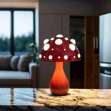 Load image into Gallery viewer, Whimsical Mushroom LED Lamp by Allthingscurated is unique and decorative, yet functional. The enchanting design features a playful mushroom silhouette, complete with red-capped spots lampshade to bring a touch of whimsy to any room. It makes a perfect gift for someone with a special affinity for mushrooms. Comes in a cordless and corded version with 2 lamp base colors.