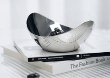 Load image into Gallery viewer, Manhattan Stainless Steel Fruit Bowl by Allthingscurated exudes elegance and modern sophistication. Crafted from high-quality stainless steel and featuring sleek, sexy curve lines with a beautiful mirror polish. Use it to beautifully present your fruits when hosting or give it as a perfect house warming gift. It’s the ultimate statement piece for contemporary homes and stylish décor. Comes in 3 sizes and nests for space-saving storage.