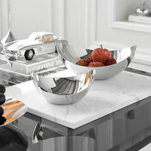 Load image into Gallery viewer, Manhattan Stainless Steel Fruit Bowl by Allthingscurated exudes elegance and modern sophistication. Crafted from high-quality stainless steel and featuring sleek, sexy curve lines with a beautiful mirror polish. Use it to beautifully present your fruits when hosting or give it as a perfect house warming gift. It’s the ultimate statement piece for contemporary homes and stylish décor. Comes in 3 sizes and nests for space-saving storage.