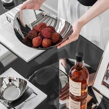 Load image into Gallery viewer, Manhattan Stainless Steel Fruit Bowl by Allthingscurated exudes elegance and modern sophistication. Crafted from high-quality stainless steel and featuring sleek, sexy curve lines with a beautiful mirror polish. Use it to beautifully present your fruits when hosting or give it as a perfect house warming gift. It’s the ultimate statement piece for contemporary homes and stylish décor. Comes in 3 sizes and nests for space-saving storage.
