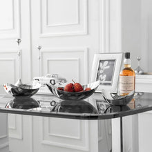 Load image into Gallery viewer, Manhattan Stainless Steel Fruit Bowl by Allthingscurated exudes elegance and modern sophistication. Crafted from high-quality stainless steel and featuring sleek, sexy curve lines with a beautiful mirror polish. Use it to beautifully present your fruits when hosting or give it as a perfect house warming gift. It’s the ultimate statement piece for contemporary homes and stylish décor. Comes in 3 sizes and nests for space-saving storage.