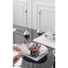 Load image into Gallery viewer, Manhattan Stainless Steel Fruit Bowl by Allthingscurated exudes elegance and modern sophistication. Crafted from high-quality stainless steel and featuring sleek, sexy curve lines with a beautiful mirror polish. Use it to beautifully present your fruits when hosting or give it as a perfect house warming gift. It’s the ultimate statement piece for contemporary homes and stylish décor. Comes in 3 sizes and nests for space-saving storage.