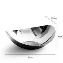Load image into Gallery viewer, Manhattan Stainless Steel Fruit Bowl by Allthingscurated exudes elegance and modern sophistication. Crafted from high-quality stainless steel and featuring sleek, sexy curve lines with a beautiful mirror polish. Use it to beautifully present your fruits when hosting or give it as a perfect house warming gift. It’s the ultimate statement piece for contemporary homes and stylish décor. Comes in 3 sizes and nests for space-saving storage. Featured here is the large size bowl.