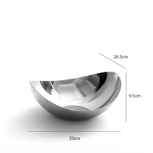 Load image into Gallery viewer, Manhattan Stainless Steel Fruit Bowl by Allthingscurated exudes elegance and modern sophistication. Crafted from high-quality stainless steel and featuring sleek, sexy curve lines with a beautiful mirror polish. Use it to beautifully present your fruits when hosting or give it as a perfect house warming gift. It’s the ultimate statement piece for contemporary homes and stylish décor. Comes in 3 sizes and nests for space-saving storage. Featured here is the medium size bowl.