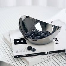 Load image into Gallery viewer, Manhattan Stainless Steel Fruit Bowl by Allthingscurated exudes elegance and modern sophistication. Crafted from high-quality stainless steel and featuring sleek, sexy curve lines with a beautiful mirror polish. Use it to beautifully present your fruits when hosting or give it as a perfect house warming gift. It’s the ultimate statement piece for contemporary homes and stylish décor. Comes in 3 sizes and nests for space-saving storage.