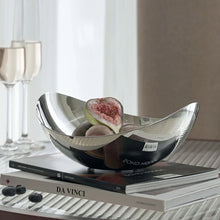 Load image into Gallery viewer, Manhattan Stainless Steel Fruit Bowl by Allthingscurated exudes elegance and modern sophistication. Crafted from high-quality stainless steel and featuring sleek, sexy curve lines with a beautiful mirror polish. Use it to beautifully present your fruits when hosting or give it as a perfect house warming gift. It’s the ultimate statement piece for contemporary homes and stylish décor. Comes in 3 sizes and nests for space-saving storage.