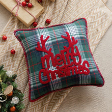Load image into Gallery viewer, Tartan Christmas Cushion Covers by Allthingscurated spots classic tartan print with embroidered snowflake, jingle bell and holiday greetings. Timeless and stylish, these covers are easy to mix and match with other solid-colored or festive pillows. They are perfect for creating a festive ensemble for your sofa or favorite couch to experience the magic of the holiday season. Featured here is Merry Christmas design in Green and Red Tartan.