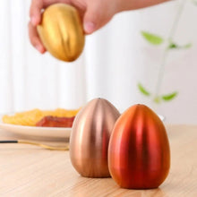 Load image into Gallery viewer, Introducing Metallic Egg Shape Salt and Pepper Shaker by Allthingscurated. This shaker is crafted from stainless steel and comes in 5 delightful colors. Perfect for Easter celebrations and as a housewarming gift. It will add a touch of playfulness to your dining table and spice up your meals with a little humor.