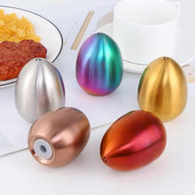 Load image into Gallery viewer, Introducing Metallic Egg Shape Salt and Pepper Shaker by Allthingscurated. This shaker is crafted from stainless steel and comes in 5 delightful colors. Perfect for Easter celebrations and as a housewarming gift. It will add a touch of playfulness to your dining table and spice up your meals with a little humor.