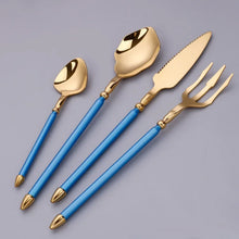 Load image into Gallery viewer, Neptune 4-piece Colored Handle Luxury Flatware Set by Allthingscurated beautifully blends mythical design with modern construction. Made from high-quality 18/10 stainless steel with a sleek mirror polishing for a modern look. Inspired by Poseidon’s Trident, the dinner fork is expertly shaped to resemble the 3-pronged spear. The set consists of a dinner spoon, dinner fork, dinner knife and a small spoon. Featured here is gold with turquoise blue handle set.