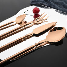 Load image into Gallery viewer, Neptune 4-piece Flatware Set by Allthingscurated beautifully blends mythical design with modern construction. Made from high-quality 18/10 stainless steel with a sleek mirror polishing for a modern look. Inspired by Poseidon’s Trident, the dinner fork is expertly shaped to resemble the 3-pronged spear. Unique and elegant, the place setting comes in silver, gold, rose gold, black and colorful rainbow and each set consists of a dinner spoon, dinner fork, dinner knife and a small spoon.