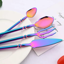 Load image into Gallery viewer, Neptune 4-piece Flatware Set by Allthingscurated beautifully blends mythical design with modern construction. Made from high-quality 18/10 stainless steel with a sleek mirror polishing for a modern look. Inspired by Poseidon’s Trident, the dinner fork is expertly shaped to resemble the 3-pronged spear. Unique and elegant, the place setting comes in silver, gold, rose gold, black and colorful rainbow and each set consists of a dinner spoon, dinner fork, dinner knife and a small spoon.