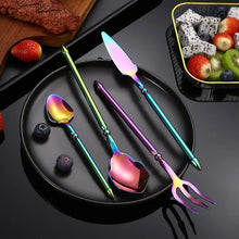 Load image into Gallery viewer, Neptune 4-piece Flatware Set by Allthingscurated beautifully blends mythical design with modern construction. Made from high-quality 18/10 stainless steel with a sleek mirror polishing for a modern look. Inspired by Poseidon’s Trident, the dinner fork is expertly shaped to resemble the 3-pronged spear. Unique and elegant, the place setting comes in silver, gold, rose gold, black and colorful rainbow and each set consists of a dinner spoon, dinner fork, dinner knife and a small spoon.