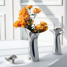Load image into Gallery viewer, Manhattan Stainless Steel Petal Vase by Allthingscurated combines modern sophistication with minimal elegance. Designed with a petal-shaped rim that opens up up like a blooming flower, it’s a fun yet refined statement piece for any home décor style. Makes a stylish gift for housewarmings. Available in 2 sizes.