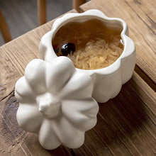 Load image into Gallery viewer, Lidded Stoneware Pumpkin Bowl by Allthingscurated features a sculptural pumpkin design.  It has a matte glaze finish in creamy white. Holds a capacity of 450mil or 15 ounce. Oozing with autumnal charm, it's the perfect serving bowl for all your thanksgiving, halloween and fall feasts.