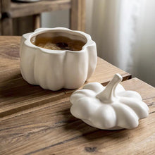 Load image into Gallery viewer, Lidded Stoneware Pumpkin Bowl by Allthingscurated features a sculptural pumpkin design.  It has a matte glaze finish in creamy white. Holds a capacity of 450mil or 15 ounce. Oozing with autumnal charm, it's the perfect serving bowl for all your thanksgiving, halloween and fall feasts.