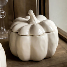 Load image into Gallery viewer, Lidded Stoneware Pumpkin Bowl by Allthingscurated features a sculptural pumpkin design.  It has a matte glaze finish in creamy white. Holds a capacity of 450mil or 15 ounce. Oozing with autumnal charm, it's the perfect serving bowl for all your thanksgiving, halloween and fall feasts.