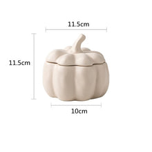 Load image into Gallery viewer, Lidded Stoneware Pumpkin Bowl by Allthingscurated features a sculptural pumpkin design.  It has a matte glaze finish in creamy white. Holds a capacity of 450mil or 15 ounce. Oozing with autumnal charm, it's the perfect serving bowl for all your thanksgiving, halloween and fall feasts.
