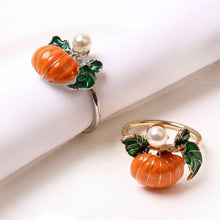 Load image into Gallery viewer, Faux Pearl Pumpkin Rings by Allthingscurated come in a set of 6 napkin rings. Each ring is crafted with exquisite detail of a pumpkin design and adorned with a faux pearl to bring a touch of sophistication. Perfect for all fall festivities, from Halloween to Thanksgiving.