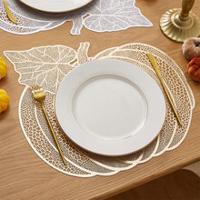 Load image into Gallery viewer, Pumpkin Vinyl Placemats by Allthingscurated are designed with perforated hollow patterns to create a unique texture and add dimension to your table setting. Made from durable PVC vinyl, they are stain-resistant and easy to maintain. Perfect for Thanksgiving and Halloween celebrations.