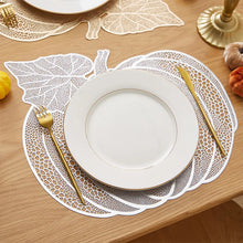 Load image into Gallery viewer, Pumpkin Vinyl Placemats by Allthingscurated are designed with perforated hollow patterns to create a unique texture and add dimension to your table setting. Made from durable PVC vinyl, they are stain-resistant and easy to maintain. Perfect for Thanksgiving and Halloween celebrations.