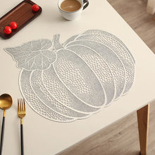 Load image into Gallery viewer, Pumpkin Vinyl Placemats by Allthingscurated are designed with perforated hollow patterns to create a unique texture and add dimension to your table setting. Made from durable PVC vinyl, they are stain-resistant and easy to maintain. Perfect for Thanksgiving and Halloween celebrations.