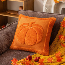 Load image into Gallery viewer, Orange pillow with pumpkin design on a brown couch, surrounded by autumn decorations. Cozy living room with a sofa adorned with pumpkin-themed pillows and a yellow blanket. The Velour Pumpkin Cushion Cover by Allthingscurated is a beautiful way to bring the warmth of fall into your home. With its elegant tufted pumpkin design and soft velour fabric, it offers both comfort and style. Perfect for autumn and Thanksgiving, this decorative pillow adds a cozy, inviting touch to any space.