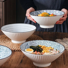 Load image into Gallery viewer, This Blue and White Japanese Ramen Bowls by Allthingscurated feature a modern, Asian design in a conical shape with a white fluted exterior, the porcelain bowls spot a beautiful, Japanese-inspired print for the interior. Comes in 4 different designs, this versatile bowl is not just for ramen, but also great for soups, curries and salads.
