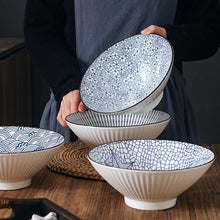 Load image into Gallery viewer, This Blue and White Japanese Ramen Bowls by Allthingscurated feature a modern, Asian design in a conical shape with a white fluted exterior, the porcelain bowls spot a beautiful, Japanese-inspired print for the interior. Comes in 4 different designs, this versatile bowl is not just for ramen, but also great for soups, curries and salads.