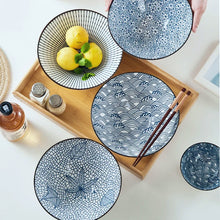 Load image into Gallery viewer, This Blue and White Japanese Ramen Bowls by Allthingscurated feature a modern, Asian design in a conical shape with a white fluted exterior, the porcelain bowls spot a beautiful, Japanese-inspired print for the interior. Comes in 4 different designs, this versatile bowl is not just for ramen, but also great for soups, curries and salads.