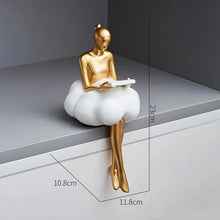 Load image into Gallery viewer, Sophie Cloud Girl Sculptures by Allthingscurated feature 2 beautiful lady statues in 2 postures—reading and pondering. Adorned with a classic ballerina bun and dressed in a minimalistic dress that ends with a voluminous skirt reminiscent of fluffy clouds. These sculptures bring a touch of serenity and sophistication to your living space. Featured here is the lady reading a book.