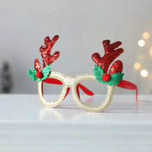 Load image into Gallery viewer, Antler Christmas Party Glasses by Allthingscurated are the perfect fun accessory for festive parties and gatherings during the holiday season. Their unique design and cheerful holiday style make them great props for creating memorable moments an happy Instagram posts to capture the joy of the season. Featured here is the Red Antler design.
