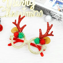 Load image into Gallery viewer, Antler Christmas Party Glasses by Allthingscurated are the perfect fun accessory for festive parties and gatherings during the holiday season. Their unique design and cheerful holiday style make them great props for creating memorable moments an happy Instagram posts to capture the joy of the season. Featured here is the Brown Antler design with red and green pom poms.