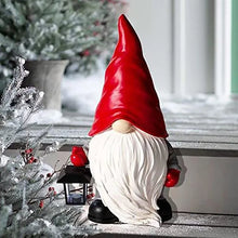 Load image into Gallery viewer, Christmas Red Gnome by Allthingscurated featuring a vibrant red pointy hat and a lantern in hand, is a charming décor idea for your Christmas holiday! It’s a delightful decorative ornament for your mantle or a stunning centerpiece for your Christmas table. Perfect for indoor charm or making a statement in your garden.