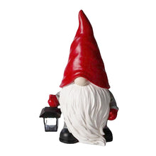 Load image into Gallery viewer, Christmas Red Gnome by Allthingscurated featuring a vibrant red pointy hat and a lantern in hand, is a charming décor idea for your Christmas holiday! It’s a delightful decorative ornament for your mantle or a stunning centerpiece for your Christmas table. Perfect for indoor charm or making a statement in your garden.