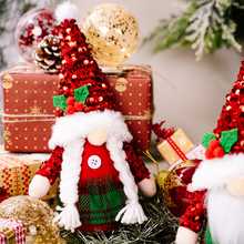 Load image into Gallery viewer, Brighten your home with these Red Sequin Gnomes by Allthingscurated featuring the favorite dolls adorned with sparkling, sequined hats and donning crimson red ensembles. They are perfect addition to your festive décor for some sparkle and shine. Available in 2 designs.