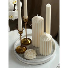 Load image into Gallery viewer, White Ribbed Column Candles by Allthingscurated are made of 100% soy wax. Hand crafted with vertical ridged pattern for texture, these candles are scented with the sweet smell of white rose. Available in 2 sizes.