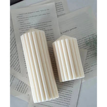 Load image into Gallery viewer, White Ribbed Column Candles by Allthingscurated are made of 100% soy wax. Hand crafted with vertical ridged pattern for texture, these candles are scented with the sweet smell of white rose. Available in 2 sizes.