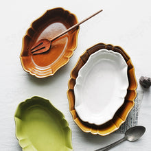 Load image into Gallery viewer, French Style Ruffle Edge Dish by Allthingscurated are oval shallow serving dishes featuring a ruffle edge with curved rims. Come in 3 colors of white, green and brown and in 2 sizes.