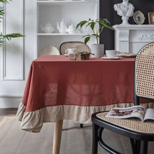 Load image into Gallery viewer, Introducing Ruffled Cotton Tablecloth by Allthingscurated. Made from 100% cotton, our tablecloth exudes French country charm with its romantic, frilly ruffles. With the perfect balance of decorative and laid-back, they have a welcoming and comforting vibe. Available in 8 solid colors.