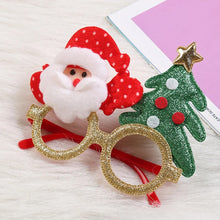 Load image into Gallery viewer, These Christmas Party Glasses by Allthingscurated are the perfect fun accessory for festive parties and gatherings during the holiday season. Their unique design and cheerful holiday style make them great props for creating memorable moments an happy Instagram posts to capture the joy of the season. Featured here is Santa Tree design.