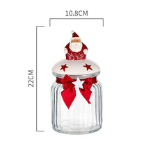Load image into Gallery viewer, Christmas Festive Storage Jars by Allthingscurated are the perfect jars to keep all your festive treats fresh and delicious. The jars are airtight and each jar is topped with a ceramic lid decorated with a Santa Claus, Christmas Tree, Penguin, Gnome or Fox. Comes in 2 sizes with capacity of 300ml or 10 ounce and 1000ml or 34 ounce. Featured here is a large Santa Claus jar.