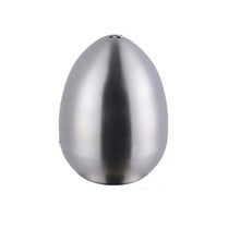 Load image into Gallery viewer, Introducing Metallic Egg Shape Salt and Pepper Shaker by Allthingscurated. This shaker is crafted from stainless steel and comes in 5 delightful colors. Perfect for Easter celebrations and as a housewarming gift. It will add a touch of playfulness to your dining table and spice up your meals with a little humor. Featured here is shaker in Silver.