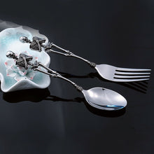 Load image into Gallery viewer, Skeleton Fork and Spoon by Allthingscurated offer a frightful but fun experience in your next dinner party. Crafted from stainless steel.